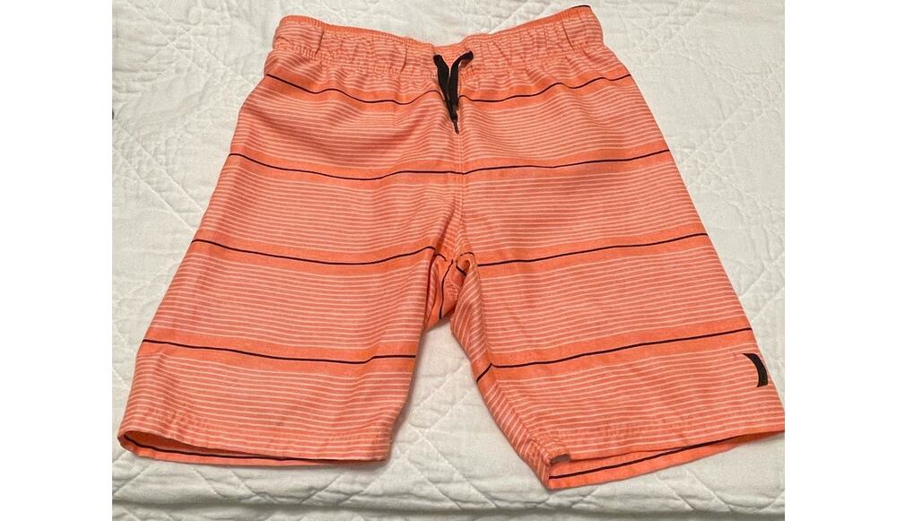 Hurley boys swim trunks 5/6 Orange with black and white stripes. Fully lined